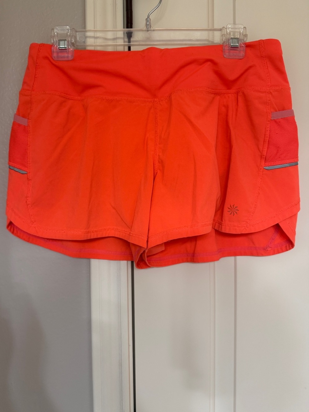 Athleta Bright Coral Running Shorts with Side Pockets